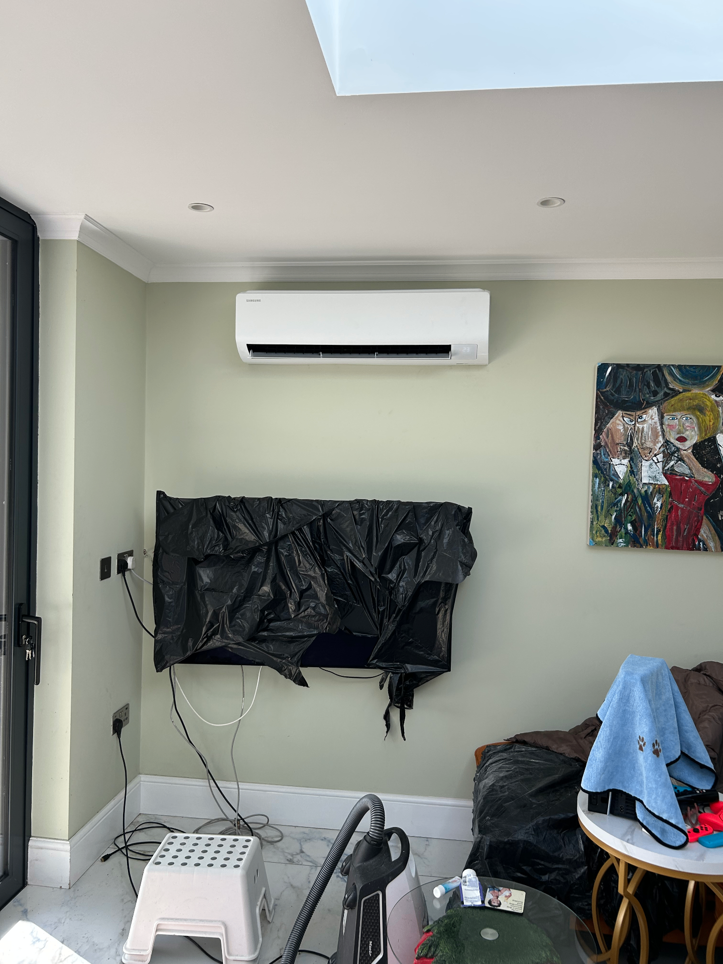 Samsung wall-mounted AC unit in living area